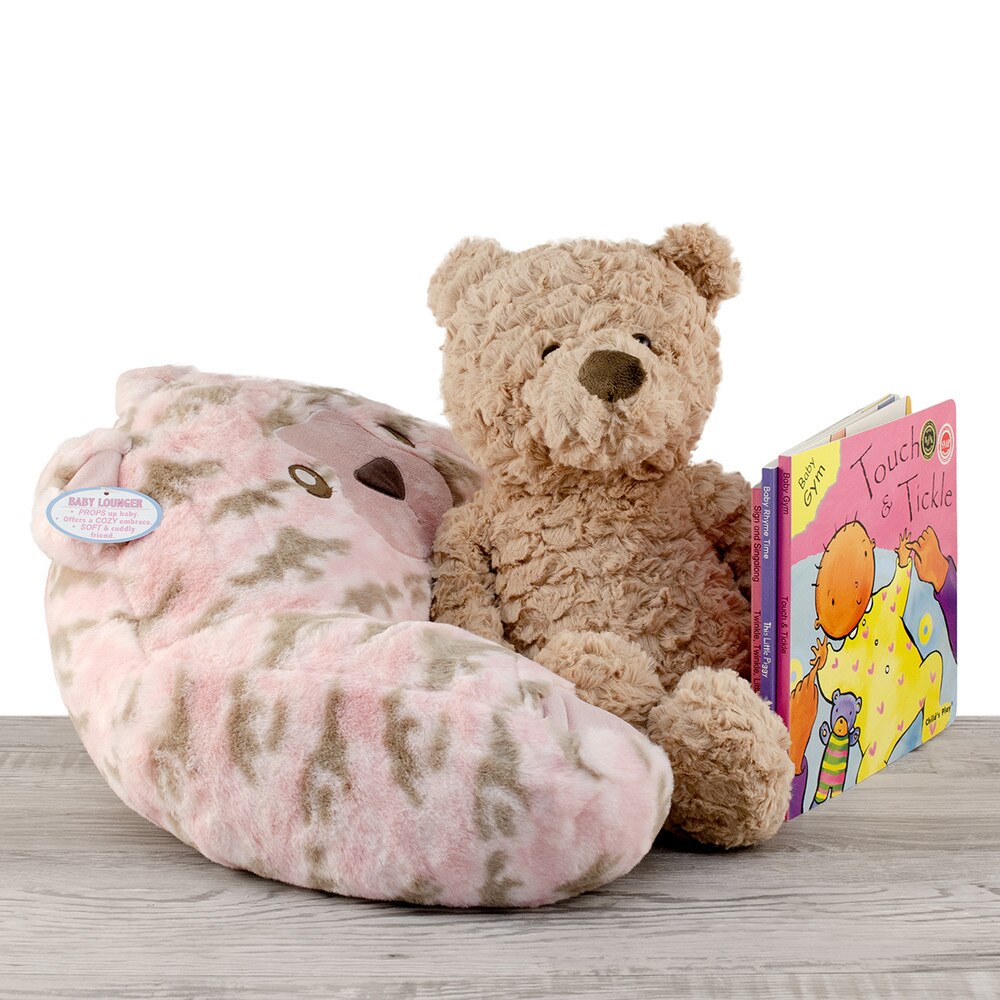 white sheep doll, pink bear baby lounger and story board nursery books